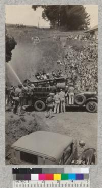 The Mill Valley tank truck built 1930 throws some water through one-half inch nozzle at Tamalpais High School demonstration