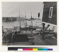 (After using, please return to: Arnold F. Wallen, Hammon, Jensen & Wallen, Mapping & Forestry Services, 1209 8th Avenue, Oakland, California.) Redwood Region--California. Loading lumber on the "Sailor Boy" a sailing schooner in the Caspar Landing, Mendocino County, California. Lumber was loaded with the wire chute until the early '30's when increased shipping costs made the truck and rail haul more practical