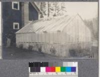 Feather River Experiment Station. Greenhouse exterior and interior, showing soil thermograph testing beds. Electrical connection to thermometer to ring bell for maximum and minmum temperatures, soil thermometer and sprinkler. It is in these small square beds that the germination tests are made, starting early in December