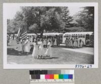 4-H Club members board the buses at Davis Convention for a day at the State Fair. September 1951. Metcalf