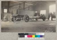 Mack fire truck in Ventura shop, October, 1930. Tank and fenders made in Los Angeles and mounted locally