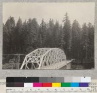 A series of 8 views (#4636-4643) of tops of trees of Dyerville Flat, Redwood Highway. Taken from high bank above road at north end of new bridge over South Fork Eel River near its mouth. E. F. July 17, 1932