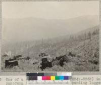 One of a series of 17 views (#5546-5563) in panorama (entire 360 degrees) of surrounding logged-off area, from stump #1046 on University of California experimental area of 1928-1930 in NW 1/4 NE 1/4 Sec. 1 T2S, R2E. Photo at noon in bright sun. 7-7-32, E.F