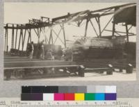 Showing the edge stacker, E. K. Lumber Company, Oakland, California, devised by its mill superintendent Mr. Joseph. A portion of Forestry 112 observing the operation. Overhead a monorail. September, 1925