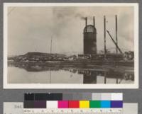 Red River Lumber Company, Westwood, California. 1 - Saw mill (saw tooth roof). 2 - Loads of logs being rolled into pond by loco crane. 3 - Log pond. 4 - Power house stacks