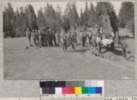 Lowering the two old renegades into their final resting place at the foot of one of the great Sequoia stumps. Metcalf. July, 1928