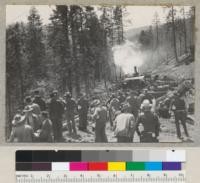 Redwood Region. Third Redwood Logging Conference visitors on operation of Pacific Lumber Company Monument Creek lateral near Scotia. 5-5-39. E. F
