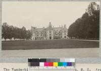 The Vanderbilt mansion at Asheville, North Carolina, from across the lawn. It was built following the design of a famous French castle, and this point is as close as any of the public are allowed to come. Automobiles are admitted to the wonderful grounds at a charge of $1.00 per car, the money being used to help keep up the roads. The massed plantings of Mountain Laurel and Rhododendron were in full bloom. June 8, 1924