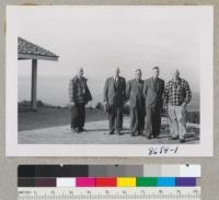 Everett Smith, Oscar Evans, Robert Burton, C. R. Tillotson, Woodbridge Metcalf - at the Everett Smiths' new home overlooking Carmel Valley and the ocean. Metcalf. December 1952