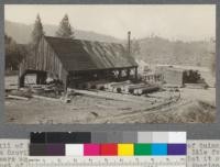 Mill of Payne & Davis Lumber Company, 1/4 mi. south of Quincy, California on Oroville road. Note dry landing. Very old. Idle for 15 years and operated again in 1920. Historic in that it cut most of the lumber for the houses and ranches in American Valley. Originally operated by Pelton Wheel. August, 1920. E.F