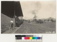 The State Division of Forestry truck brought boxes to show effects of fire on run-off, percolation and erosion. Cooperation of Cecil Metcalf and Arthur Mullen. Fire demonstration, Tulare County, 1940. Metcalf