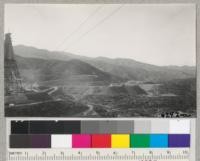 Site of Shasta Dam in May, 1941, with the hills in background denuded from old smelter fume injury. Metcalf