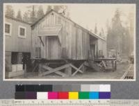 Fly traps around the kitchen and meat house, enclosed garbage cans and sanitary out-houses are essential features of the McCloud River camps