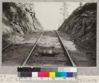 Top of incline showing iron rollers to support cable. Madera Sugar Pine Company. D. Bruce - 1921. 4.3244