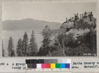 A group of 4-H Club members from Butte County on a rocky point overlooking Buck's Lake. Metcalf