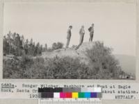 Ranger Wilcher, Washburn and Hunt at Eagle Rock, Santa Cruz County, site of new lookout station. 1935. Metcalf