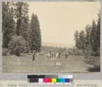 Camp Califorest. First day of surveying. The class "adjusts" instruments in the camp meadow. 6/10/36. E.F
