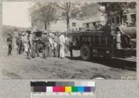 Fairbank demonstrates the equipment on the state truck. Sonora, 1930