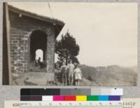 The arcade, or front porch, of the Grizzly Peak lookout house. The porch faces west. Photograph shows type of construction--hollow tile walls trimmed with brick, and tile roof. Feb. 1929