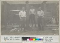 Neil Derrick, Caretaker Charles Crose and his companion at Whitaker's Forest headquarters April 20, 1936. Metcalf