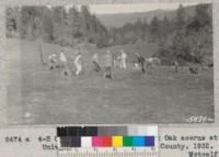 4-H Club members planting Cork Oak acorns at University Forest, Mendocino County. 1932. Metcalf
