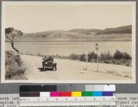 Elizabeth Lake, California, Los Angeles County. On the Tejon Pass route from Los Angeles to Bakersfield. Furnishes power for electrical development. Fringed only by scattered poplars and willows. One of former in extreme left of photo