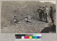 Some of the Orange County camp site committee pointing out the proposed site from the new highway above Hot Springs. Feb. 1931