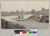 A "current power" automobile ferry across the French Broad River near Knoxville, Tenn. When the wind is adverse it sometimes takes several attempts before the boat can make the opposite bank