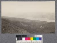 View from Mount Vision over Bishop Pine and Laurel forest across Tomales Bay to the base hills beyond. September 1921