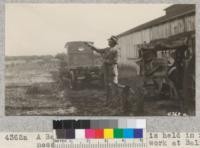 A Bean spray pump outfit is held in readiness for fire protection work at Balfour-Guthrie ranch near Brentwood, Contra Costa County. It works under 350 lbs. pressure and throws about 28 gallons of water a minute. Metcalf. May, 1928