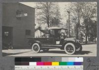 Studebaker fire truck. Yolo County. Bought by Yolo County. Fire extinguishers furnished by fire insurance agents at Woodland. This truck went to 13 fires its first year