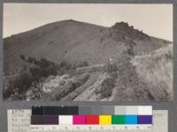 This man utilized the water in this narrow canyon to produce corn, Sudan grass and many garden vegetables. He has obtained three cuttings of Sudan grass or more than five tons per acre. J. W. Shreffler, Durkee, Oregon