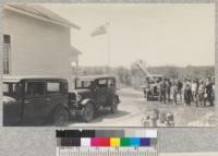 Throwing water on the roof at the Glennville School, Kern County, with the Barton pump and the 5/16" shut-off nozzle under 150 lbs. Metcalf. 1929