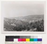 Southern Mendocino County, California. View east from top of grade on old Redwood Highway, head of Alder Creek, looking over Russian River canyon. Depicting chaparral and oak on ranch lands. No commercial timber. 6/8/52. E.F