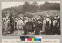 The feature of the Santa Cruz Forestry tour of 1928 was the demonstration of nursery work given by the Felton 4H Club. Henry Washburn and Ex-Lieut. Gov. Jeter at the left. Metcalf. July, 1928