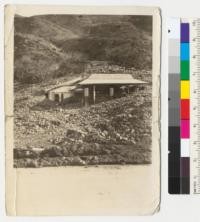 Service station on Roosevelt Highway, short distance from Point Nugu. Photo between January 3 and March 3, 1933. Some movement of soil occurred after this was taken. Negative of this copy of the picture on the right made August 1950 by Clark Gleason, California Forest Experiment Station