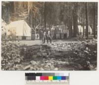 Camp Califorest. Schneider Creek at lower end of camp site. View from about tent #2 upstream, showing wall built 1936 by the 2 Civilian Conservation Corps boys pictured. June 19, 1936 E.F