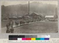 The Percy Brown Sawmill above Scotia, California. Just after men left cookhouse at noon after listening to a Chatauqua speaker. This is a circular sawmill with a band resaw. Note logging close to mill. On State Highway. 6-9-23, E.F