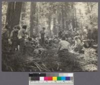 Camp Califorest. Forest Ranger Kloppenberg critisizing fire trail lay out and construction by class on a dummy fire near camp. 6/26/36 E.F