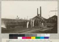 Class in Forestry 112 studying the wood preserving plant of the Southern Pacific Railway, Nov. 1924. E.F