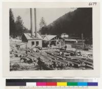 [No caption on photograph. Possibly shows members of the U.S. Army Signal Corps, Spruce Production Division (Spruce Squadron) and their logging operations in the Pacific Northwest during World War I.]