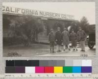 A rainy day trip of class in Forestry 106 to the nursery at Niles. Edwards (Penn), Thede, Hansen, Gevorkiantz, and Robinson, November, 1924