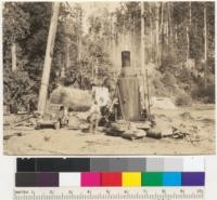 Redwood. Loading an 8' log to a Ford truck. Klamath-California Lumber Company operation near Klamath, California. Frank Fraser's contract. See also 6435, 6, 7, 9. 8-16-37. E.F