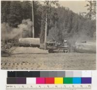 Redwood. Loading an 8' log to a Ford truck. Klamath-California Lumber Company operation near Klamath, California. Frank Fraser's contract. See also 6435, 6, 8, 9. 8-16-37. E.F