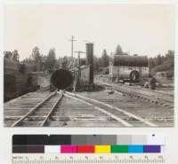 Treating plant using chemonite at Diamond Match Company, Stirling City, California. Cylinder is 6' x 36'. Built in 1935 and used regularly without repairs. No corrosion on inside. See also #6980. Mixing tanks to right out of the picture. 8-6-41. E.F