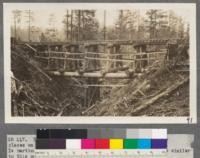 Type of timber bent railroad trestle used in many places on the logging railroads of the Portland Lumber Company. Is particularly adaptable to canyons with very steep sides similar to this one