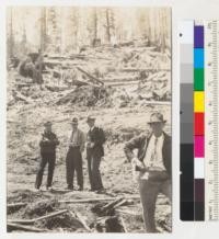 Fourth Redwood Logging Conference. Monument Creek, Scotia, California. In photo are George F. Cornwall, H. I. Bower, and L. N. Erickson; to far right, John Slotte (Rockport). 5-10-40. E. F