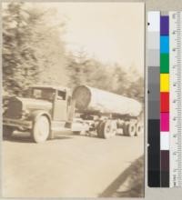 Redwood Region. A large redwood log from Baker and Son's operation on Van Duzen River. Snapped en route to railroad at Carlotta. 8-15-36. E.F