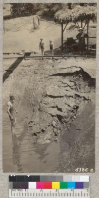 Collapse of a portion of the south wall of Whitaker's pool at about 30 minutes after the intake was opened and the pool was about empty. July and August 1930