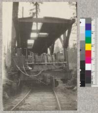 Electric Yarder and Loader combined car unit (Willamette) showing loader controls, forward loader drum and spotting drum. Controls can be slid across car. Sugar Pine Company